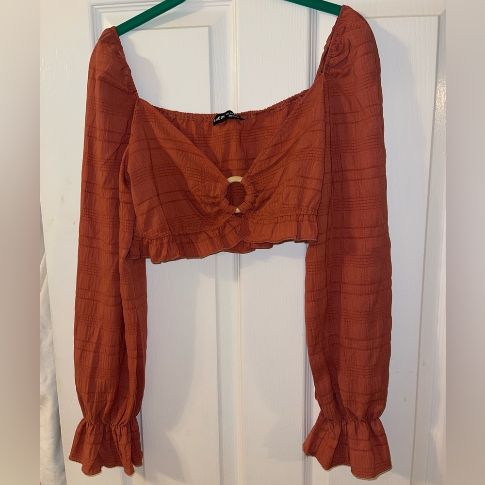 Women’s long sleeve burnt orange crop top from Shein. Size L. Worn once!